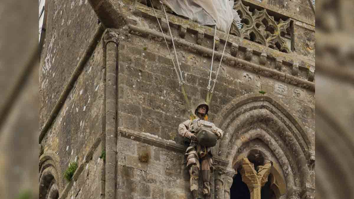 A Paratrooper Started D Day By Hanging From His Chute On A Church a-paratrooper-started-d-day-by-hanging-from-his-chute-on-a-church